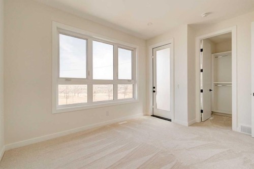 39B Moncton Road Ne, Calgary, AB - Indoor Photo Showing Other Room