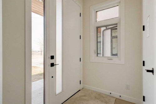 39B Moncton Road Ne, Calgary, AB - Indoor Photo Showing Other Room