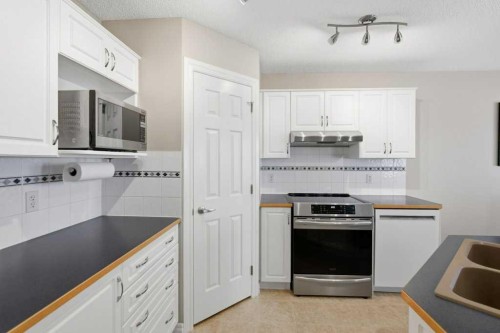 34 Arbour Stone Rise Nw, Calgary, AB - Indoor Photo Showing Kitchen