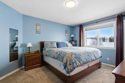 34 Arbour Stone Rise Nw, Calgary, AB - Indoor Photo Showing Bedroom