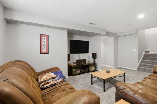 34 Arbour Stone Rise Nw, Calgary, AB - Indoor Photo Showing Living Room