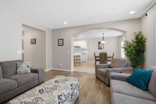 34 Arbour Stone Rise Nw, Calgary, AB - Indoor Photo Showing Living Room