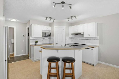 34 Arbour Stone Rise Nw, Calgary, AB - Indoor Photo Showing Kitchen