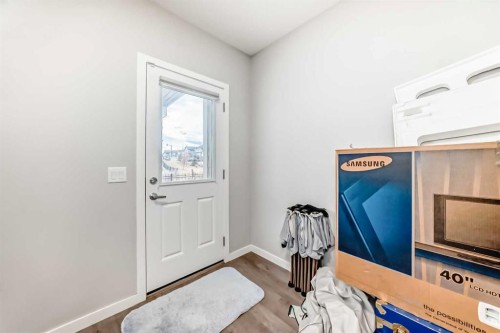 151 Sundown Way, Cochrane, AB - Indoor Photo Showing Other Room