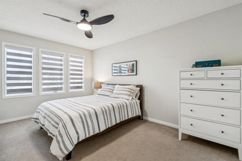 321 Windstone Gardens Sw, Airdrie, AB - Indoor Photo Showing Bedroom