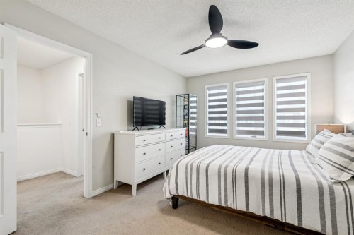 321 Windstone Gardens Sw, Airdrie, AB - Indoor Photo Showing Bedroom