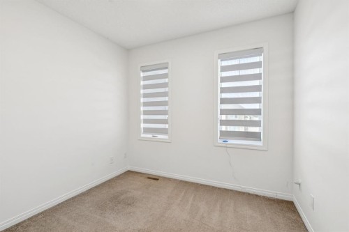 321 Windstone Gardens Sw, Airdrie, AB - Indoor Photo Showing Other Room