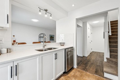 321 Windstone Gardens Sw, Airdrie, AB - Indoor Photo Showing Kitchen With Double Sink