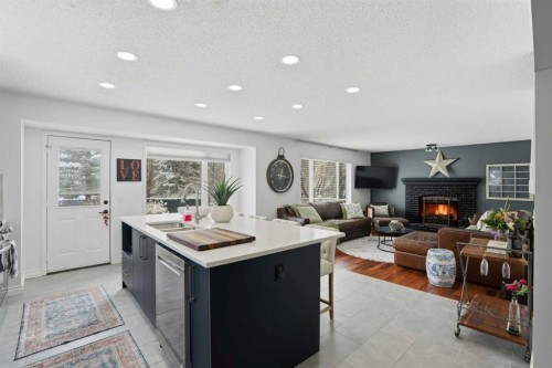 123 Schubert Hill Nw, Calgary, AB - Indoor With Fireplace