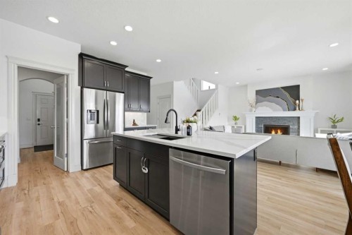 1153 Kingston Crescent Se, Airdrie, AB - Indoor Photo Showing Kitchen With Stainless Steel Kitchen With Upgraded Kitchen