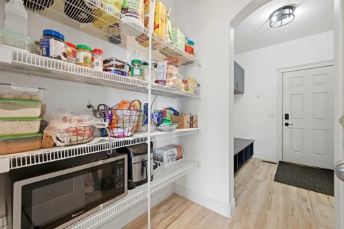 1153 Kingston Crescent Se, Airdrie, AB - Indoor With Storage