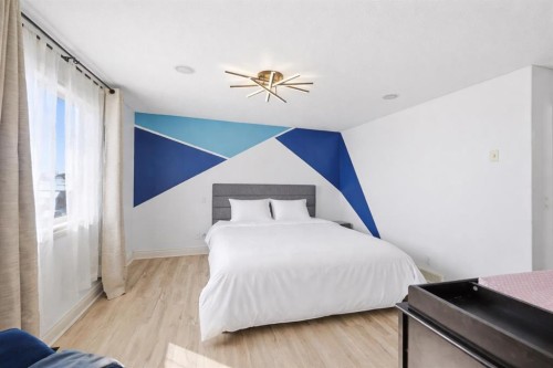 1153 Kingston Crescent Se, Airdrie, AB - Indoor Photo Showing Bedroom