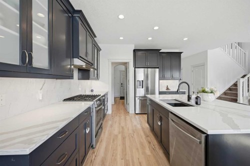 1153 Kingston Crescent Se, Airdrie, AB - Indoor Photo Showing Kitchen With Stainless Steel Kitchen With Upgraded Kitchen