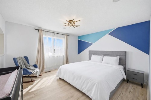 1153 Kingston Crescent Se, Airdrie, AB - Indoor Photo Showing Bedroom