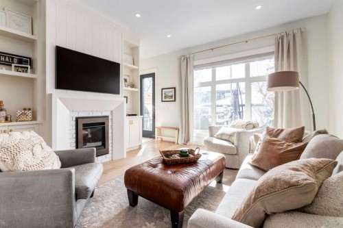 2107 52 Avenue Sw, Calgary, AB - Indoor Photo Showing Living Room With Fireplace