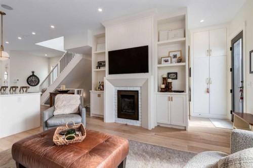 2107 52 Avenue Sw, Calgary, AB - Indoor Photo Showing Living Room With Fireplace