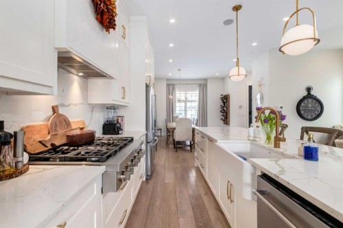 2107 52 Avenue Sw, Calgary, AB - Indoor Photo Showing Kitchen With Upgraded Kitchen