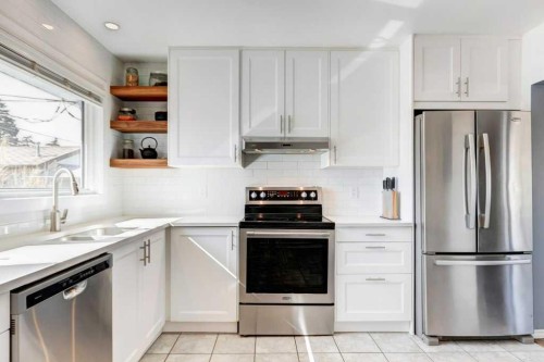 81 Healy Drive Sw, Calgary, AB - Indoor Photo Showing Kitchen With Stainless Steel Kitchen With Upgraded Kitchen