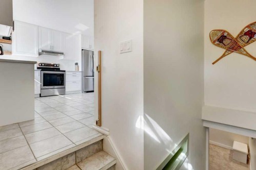 81 Healy Drive Sw, Calgary, AB - Indoor Photo Showing Kitchen