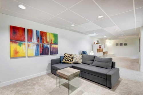 81 Healy Drive Sw, Calgary, AB - Indoor Photo Showing Living Room