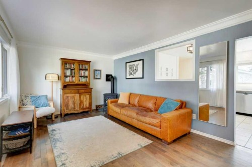 81 Healy Drive Sw, Calgary, AB - Indoor Photo Showing Living Room