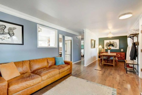 81 Healy Drive Sw, Calgary, AB - Indoor Photo Showing Living Room