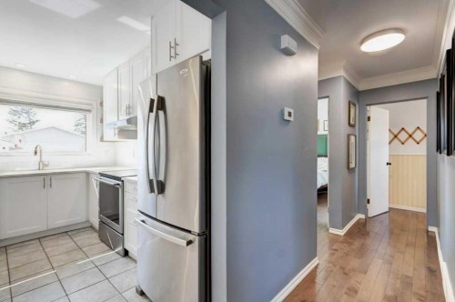 81 Healy Drive Sw, Calgary, AB - Indoor Photo Showing Kitchen With Stainless Steel Kitchen