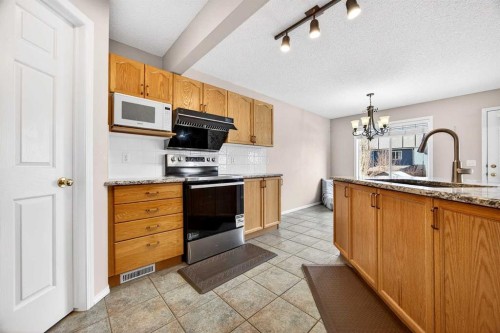 287 Panamount Drive Nw, Calgary, AB - Indoor Photo Showing Kitchen