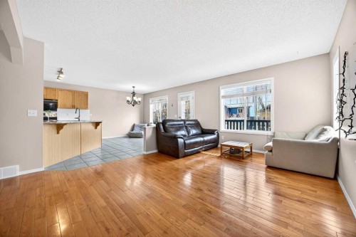287 Panamount Drive Nw, Calgary, AB - Indoor Photo Showing Living Room