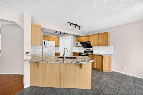 287 Panamount Drive Nw, Calgary, AB - Indoor Photo Showing Kitchen