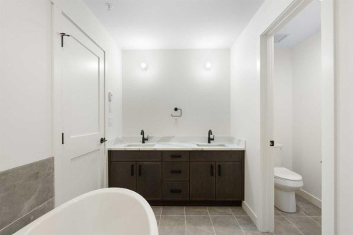 402-1505 Spring Creek Gate, Canmore, AB - Indoor Photo Showing Bathroom