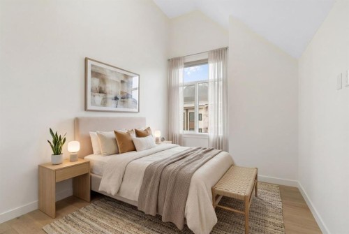 402-1505 Spring Creek Gate, Canmore, AB - Indoor Photo Showing Bedroom