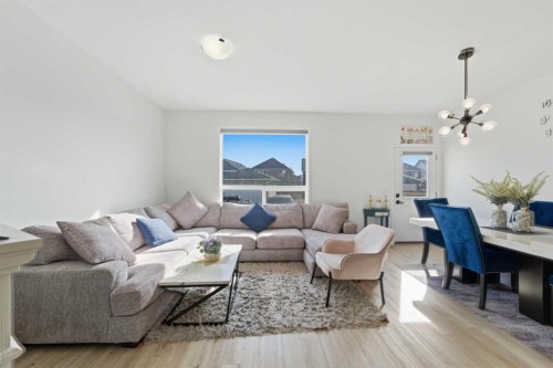 233 Copperleaf Way Se, Calgary, AB - Indoor Photo Showing Living Room