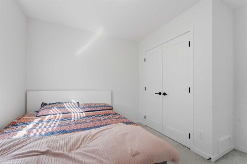 233 Copperleaf Way Se, Calgary, AB - Indoor Photo Showing Bedroom