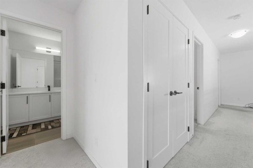 233 Copperleaf Way Se, Calgary, AB - Indoor Photo Showing Other Room