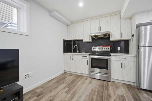233 Copperleaf Way Se, Calgary, AB - Indoor Photo Showing Kitchen With Stainless Steel Kitchen