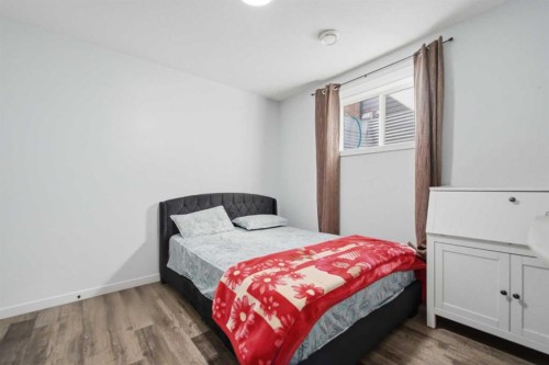 233 Copperleaf Way Se, Calgary, AB - Indoor Photo Showing Bedroom