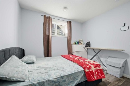 233 Copperleaf Way Se, Calgary, AB - Indoor Photo Showing Bedroom