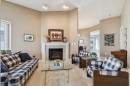 22 Confederation Villas Nw, Calgary, AB  - Indoor With Fireplace 