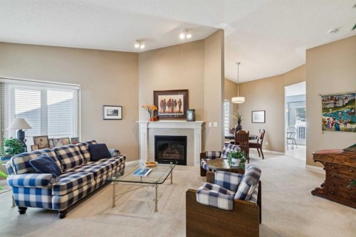 22 Confederation Villas Nw, Calgary, AB - Indoor Photo Showing Living Room With Fireplace