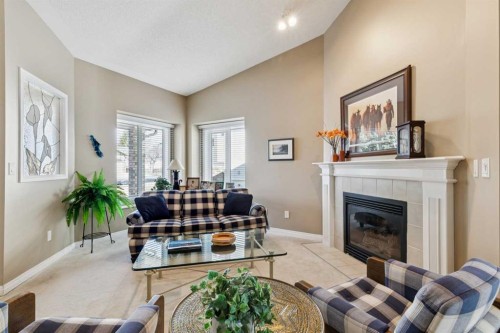 22 Confederation Villas Nw, Calgary, AB - Indoor Photo Showing Living Room With Fireplace