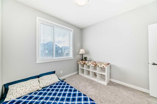 111 Redstone Crescent Ne, Calgary, AB - Indoor Photo Showing Bedroom