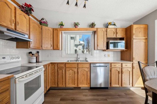 412 Hawkland Place Nw, Calgary, AB - Indoor Photo Showing Kitchen With Double Sink