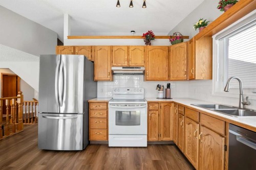 412 Hawkland Place Nw, Calgary, AB - Indoor Photo Showing Kitchen With Double Sink