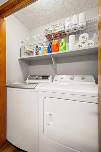 412 Hawkland Place Nw, Calgary, AB - Indoor Photo Showing Laundry Room