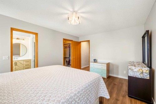 412 Hawkland Place Nw, Calgary, AB - Indoor Photo Showing Bedroom