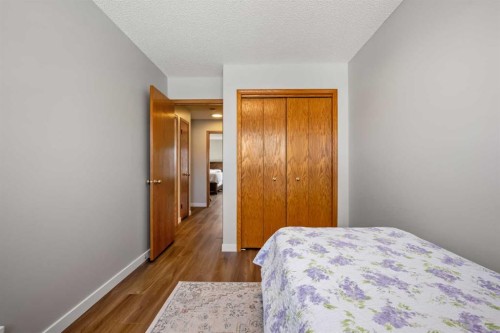 412 Hawkland Place Nw, Calgary, AB - Indoor Photo Showing Bedroom