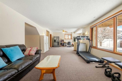 412 Hawkland Place Nw, Calgary, AB - Indoor Photo Showing Gym Room
