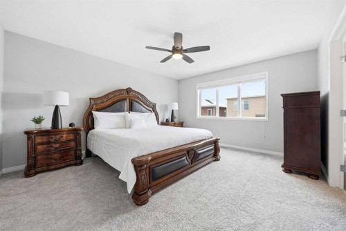 134 Windrow Link Sw, Airdrie, AB - Indoor Photo Showing Bedroom