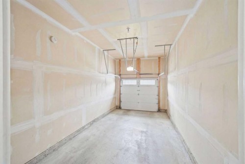134 Windrow Link Sw, Airdrie, AB - Indoor Photo Showing Garage